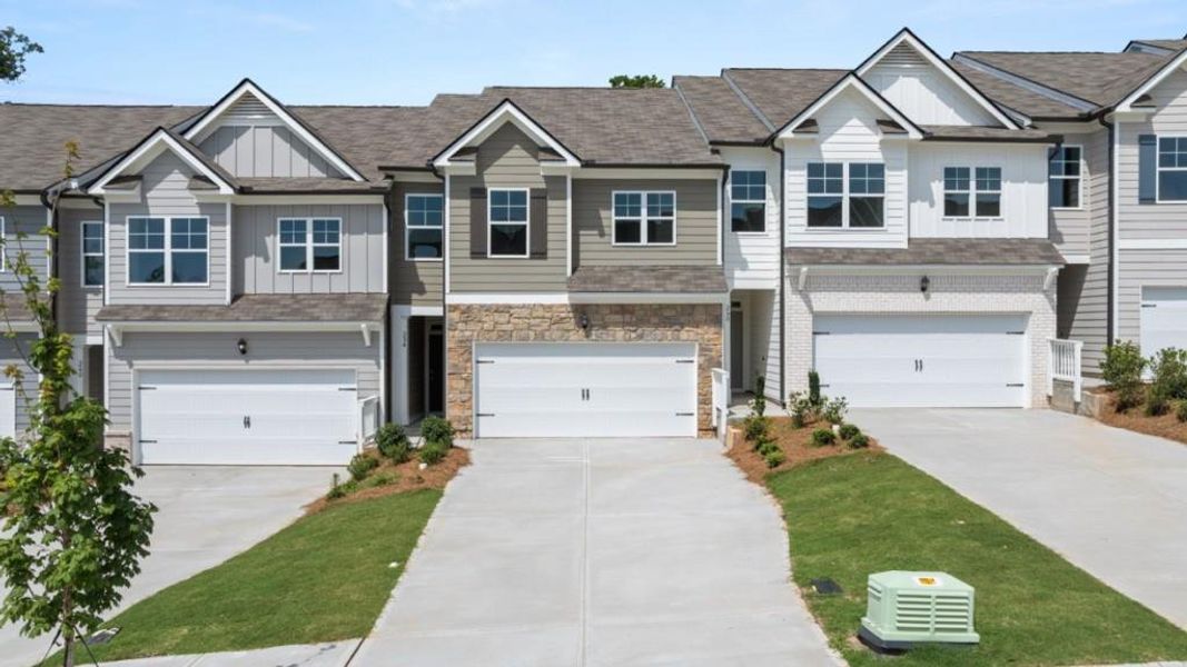Front exterior of a new home in Rolling Meadows, Jasper, GA, highlighting curb appeal (Image 1). Front exterior of a new home in Rolling Meadows, Jasper, GA, highlighting curb appeal (Image 1).