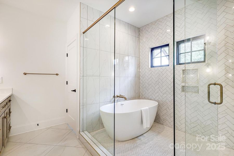 Primary bathroom freestanding tub and shower