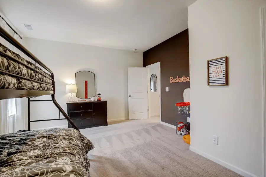 The Palmer- Bedroom 3. The sample image is a staged model, to be used for illustrative purposes only. Upgrades, options, and colors will vary.
