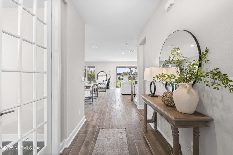 Furnished interior view inside a new home in The Cove at Beachwalk, St. Johns (Image 37). Furnished interior view inside a new home in The Cove at Beachwalk, St. Johns (Image 37).