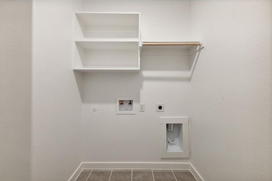 Utility room in the Masters home plan by Trophy Signature Homes – REPRESENTATIVE PHOTO Utility room in the Masters home plan by Trophy Signature Homes – REPRESENTATIVE PHOTO