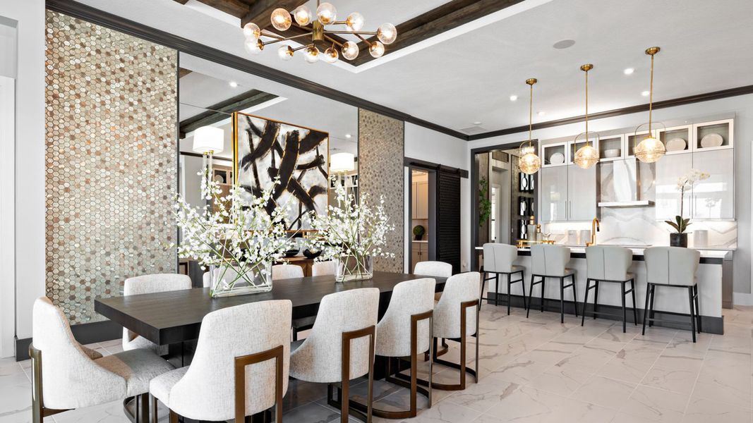 Dining Area to Kitchen - Model shown from sister community