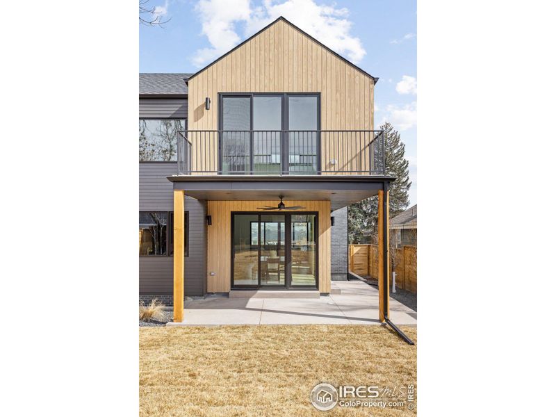 Generous covered back patio for outdoor entertaining.