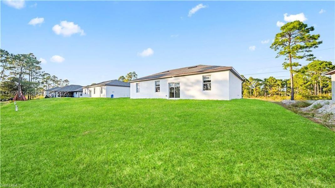 Exterior details and patio area of a home in , Lehigh Acres (Image 4).