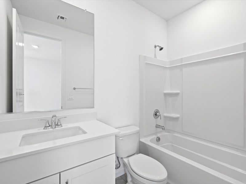 Furnished interior view inside a new home in Mountain View Estates Signature Series, Buckeye (Image 5).