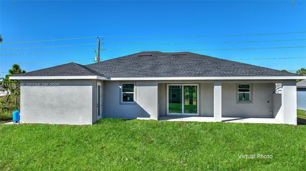 Exterior details and patio area of a home in , Lehigh Acres (Image 4). Exterior details and patio area of a home in , Lehigh Acres (Image 4).