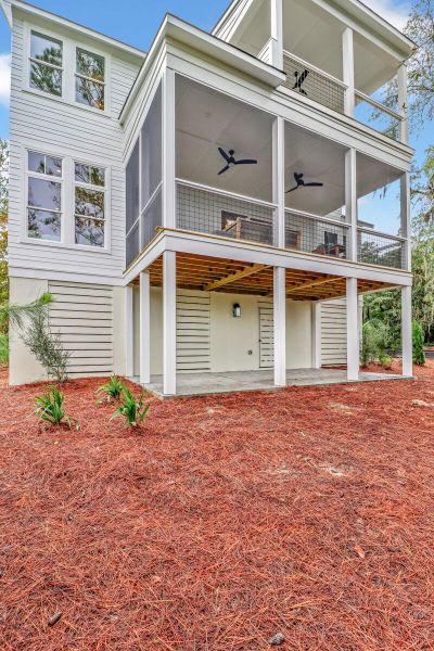 Exterior details and patio area of a home in The Preserve at Pennys Creek, Johns Island (Image 15).