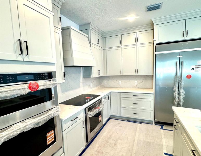 Furnished interior view inside a new home in The Reserve at Eastpointe, Palm Beach Gardens (Image 7). Furnished interior view inside a new home in The Reserve at Eastpointe, Palm Beach Gardens (Image 7).