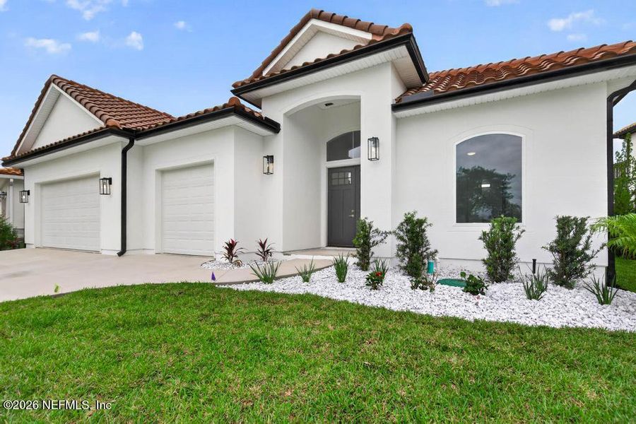 Front exterior of a new home in , St. Johns, FL, highlighting curb appeal (Image 33).