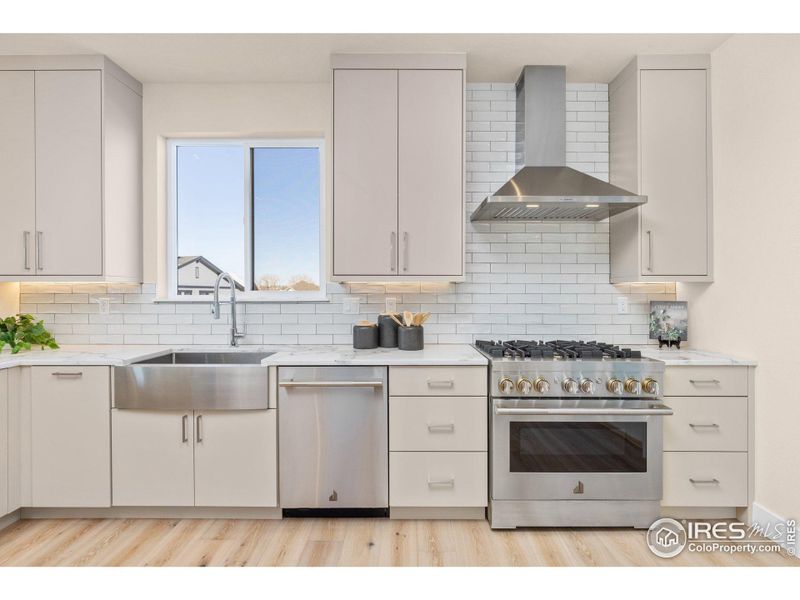 Kitchen with 6-burner gas range