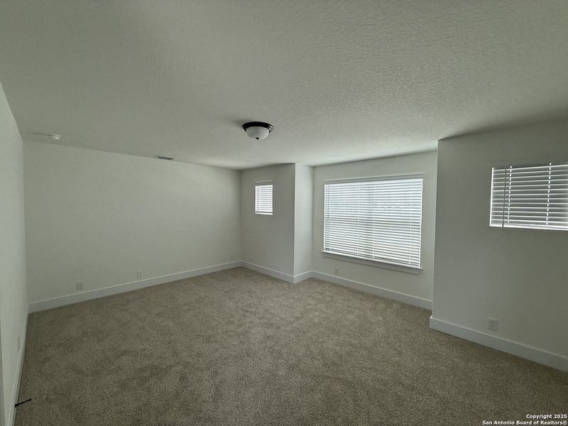 Spacious, unfurnished interior of a new home in Buffalo Crossing – New Phase Now Preselling, Cibolo (Image 16).