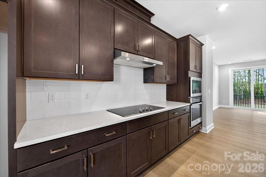 White quartz countertops and white backsplash