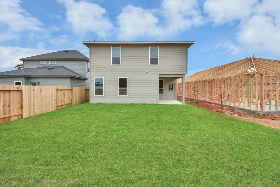 Exterior details and patio area of a home in The Enclave at Spring Branch, Conroe (Image 26).