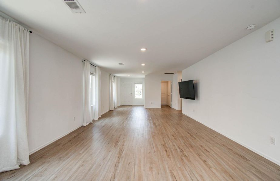 Spacious, unfurnished interior of a new home in Tavola: Cottage Collection, New Caney (Image 18).