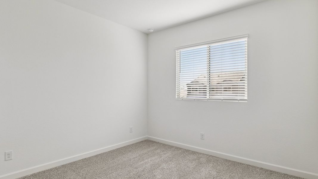 Spacious, unfurnished interior of a new home in Apache Farms, Buckeye (Image 33).