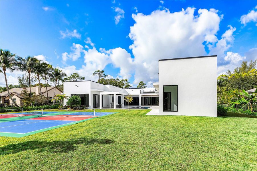 Exterior details and patio area of a home in , Parkland (Image 30).