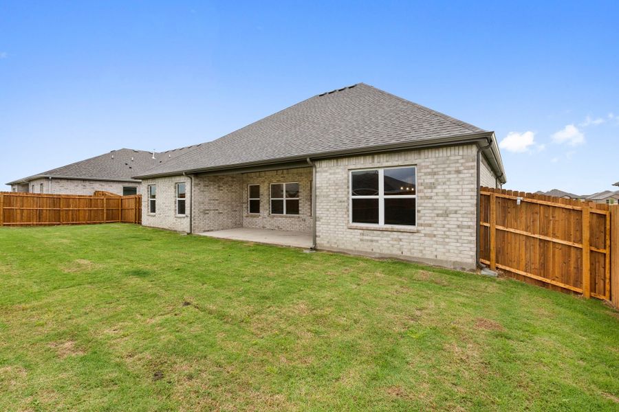 Front exterior of a new home in Waverly Estates, Nevada, TX, highlighting curb appeal (Image 71).