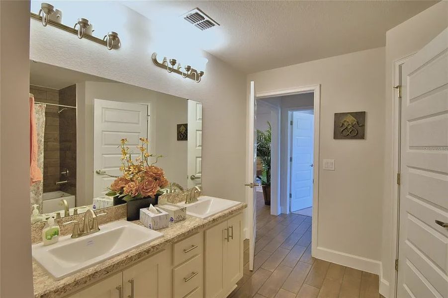 Furnished interior view inside a new home in Magnolia Park, Haines City (Image 19).
