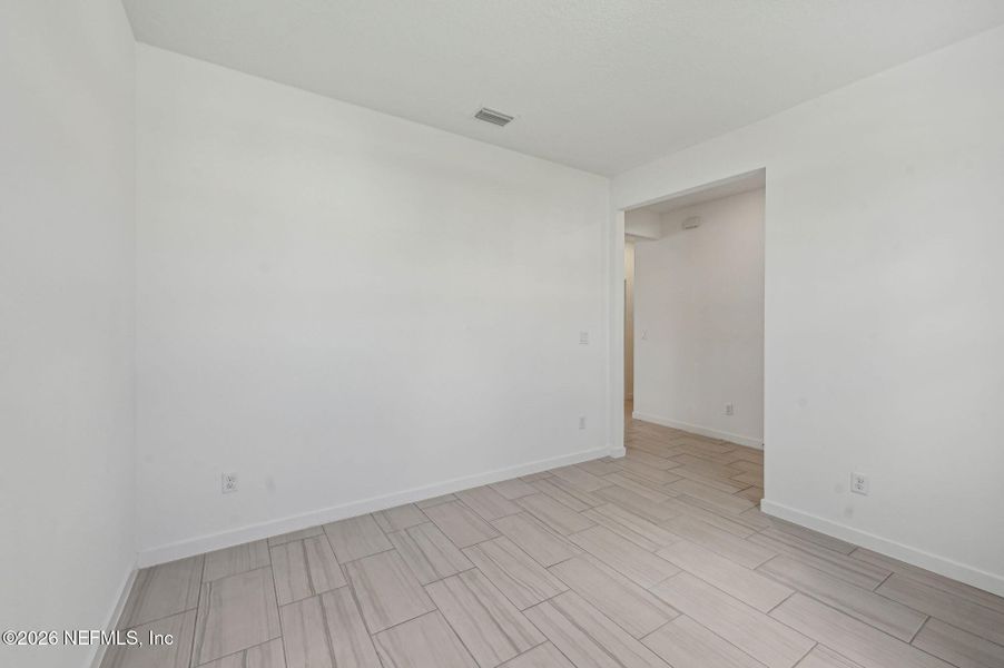 Spacious, unfurnished interior of a new home in Lakes at Bella Lago - Signature Series, Green Cove Springs (Image 25).