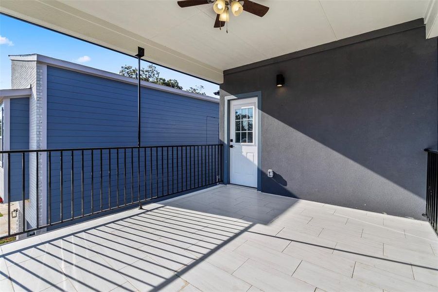 View of patio with ceiling fan