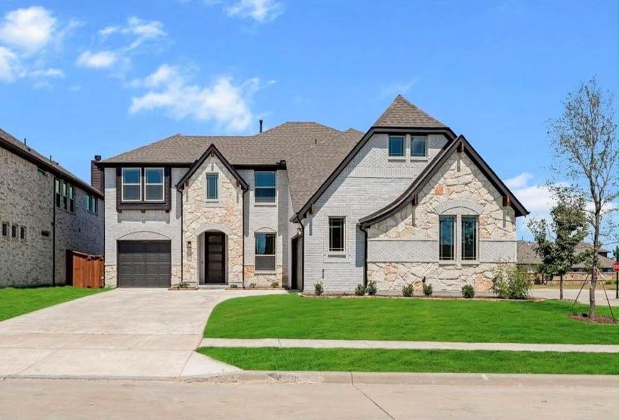 Front exterior of a new home in Willow Wood Classic 60, McKinney, TX, highlighting curb appeal (Image 1). Front exterior of a new home in Willow Wood Classic 60, McKinney, TX, highlighting curb appeal (Image 1).
