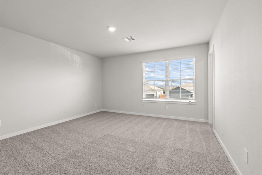 Spacious, unfurnished interior of a new home in Liberty Collection at Paloma at Sanford Farms, Waller (Image 12).