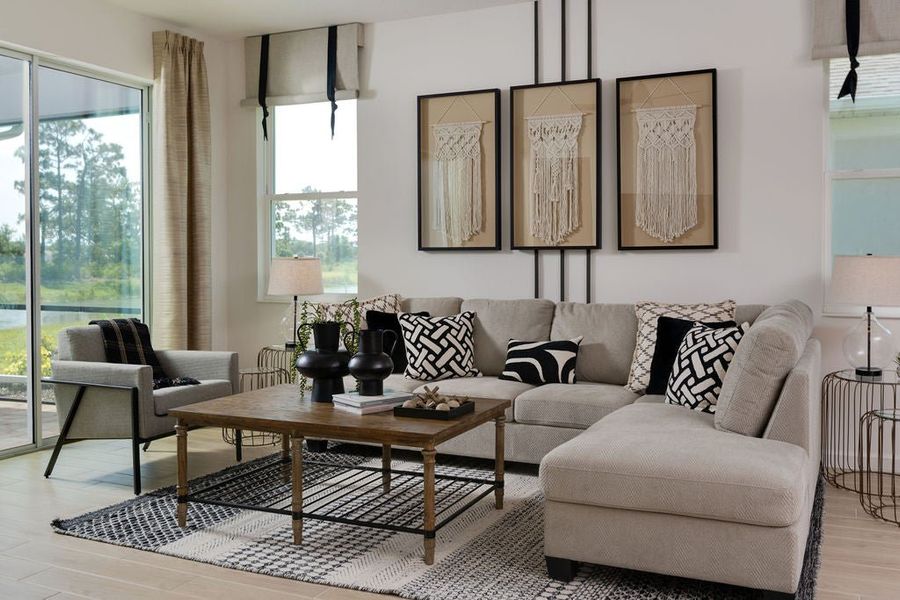 Representative furnished interior of a home built from the Hampton II by Park Square Residential in Brighton, Venice (Image 8).