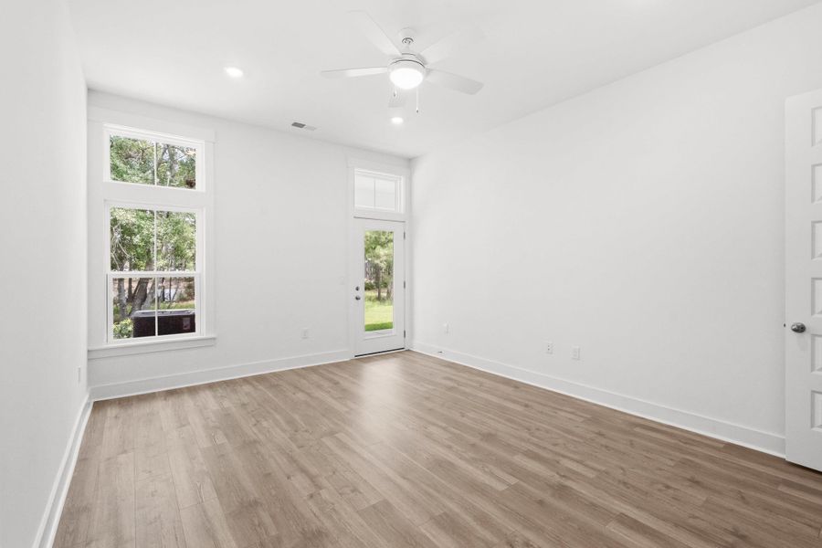 Spacious, unfurnished interior of a new home in Long Bay Golf Club, Longs (Image 26).
