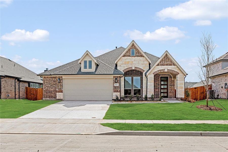 Front exterior of a new home in West Crossing, Anna, TX, highlighting curb appeal (Image 2).