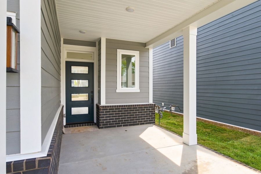 Exterior details and patio area of a home in Nexus – Park Collection, Gallatin (Image 22).