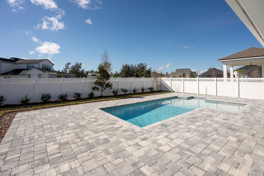 Exterior details and patio area of a home in SilverLeaf, St. Augustine (Image 27).