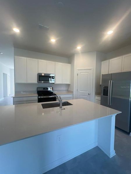 Furnished interior view inside a new home in Astonia: Estate Collection, Davenport (Image 4).