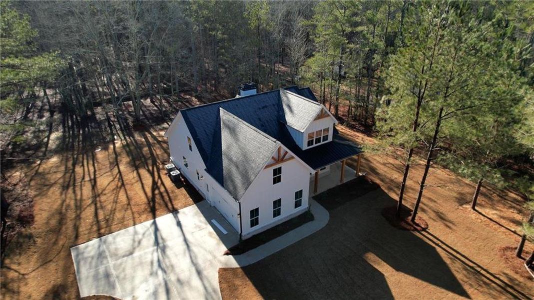 Front exterior of a new home in , Mansfield, GA, highlighting curb appeal (Image 29).