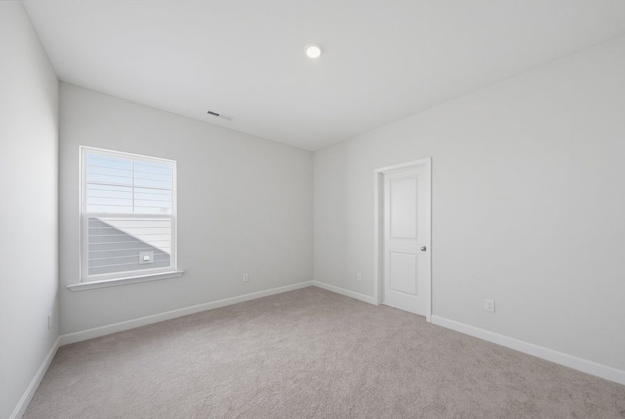 Spacious, unfurnished interior of a new home in Sweetbrier, Durham (Image 32).