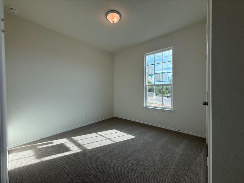 Spacious, unfurnished interior of a new home in River Bluff, Leander (Image 19).