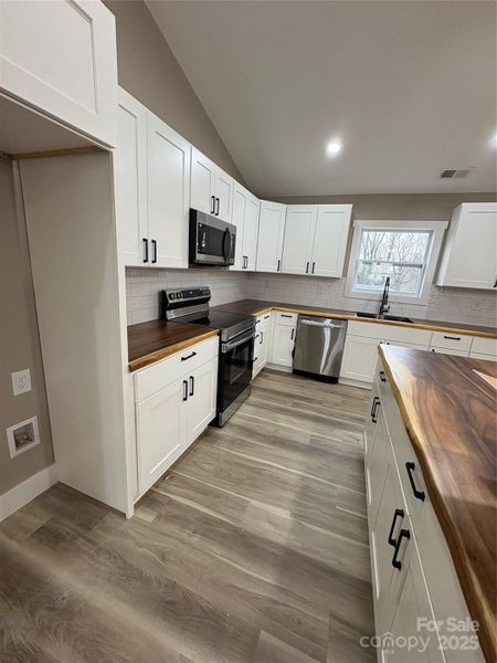 Furnished interior view inside a new home in , Lenoir (Image 5).