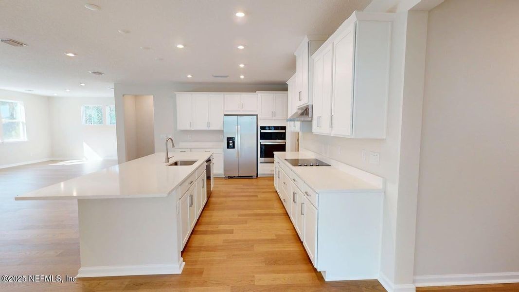Furnished interior view inside a new home in Lakes at Bella Lago, Green Cove Springs (Image 8).