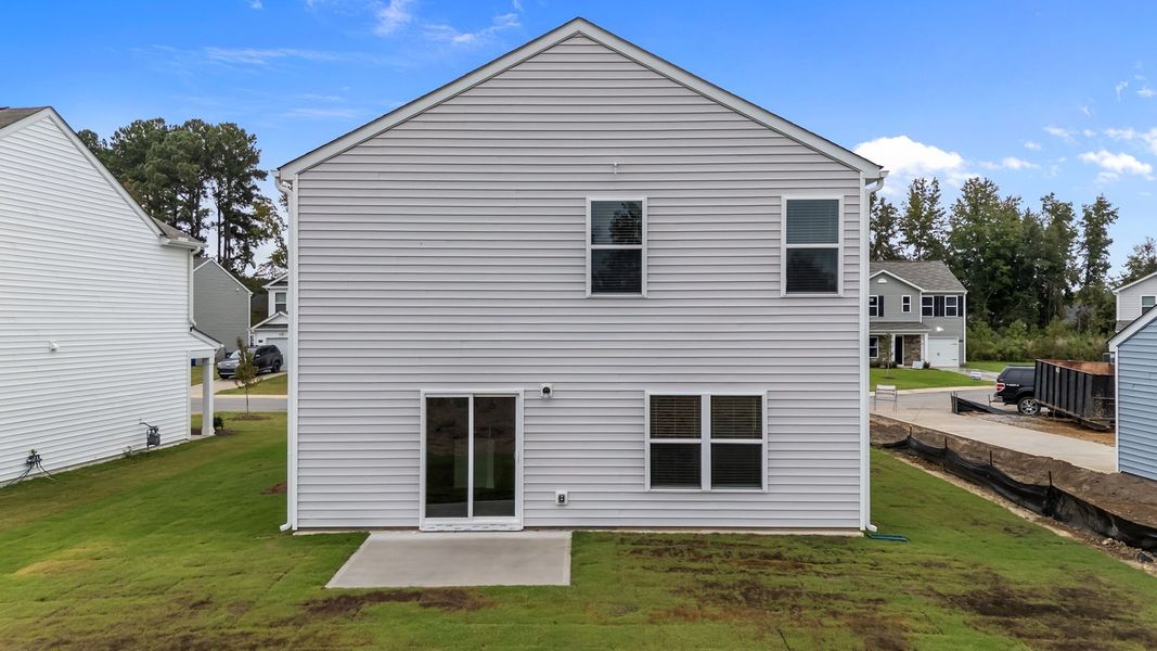 Exterior details and patio area of a home in Hobbs Farm, Ayden (Image 15).