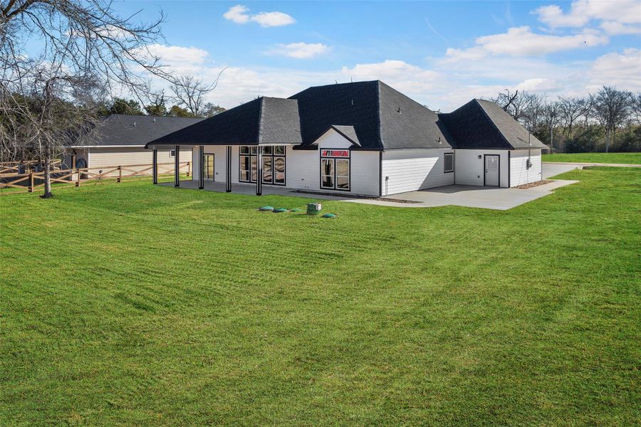 Front exterior of a new home in , Hempstead, TX, highlighting curb appeal (Image 16).