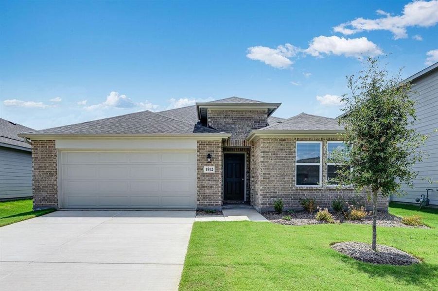Front exterior of a new home in River Ridge, Crandall, TX, highlighting curb appeal (Image 1). Front exterior of a new home in River Ridge, Crandall, TX, highlighting curb appeal (Image 1).