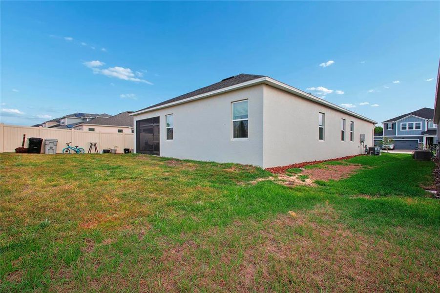 Exterior details and patio area of a home in Emerson Pointe, Apopka (Image 3). Exterior details and patio area of a home in Emerson Pointe, Apopka (Image 3).