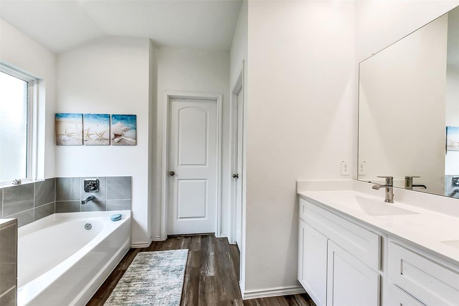 Furnished interior view inside a new home in Sunterra, Katy (Image 8).