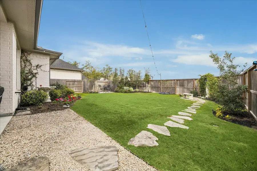 The beautifully maintained backyard offers a generous amount of space to play, garden, or create your own outdoor retreat. No back neighbors also offer additional privacy