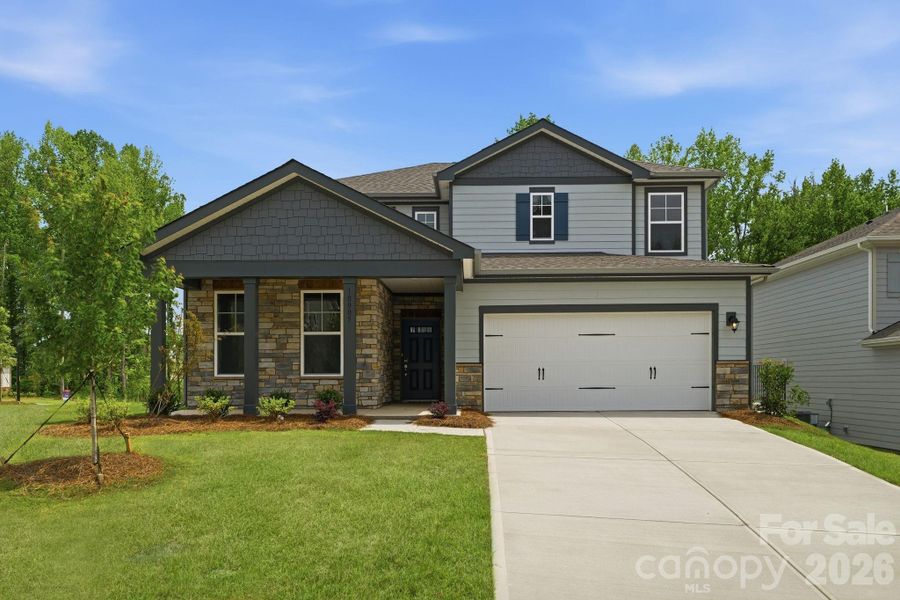 Front exterior of a new home in Cannon Manor, Kannapolis, NC, highlighting curb appeal (Image 1). Front exterior of a new home in Cannon Manor, Kannapolis, NC, highlighting curb appeal (Image 1).