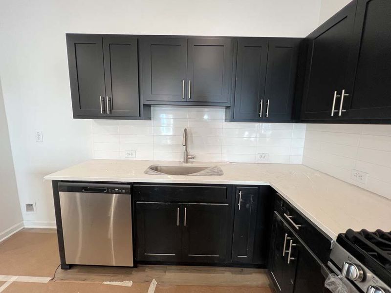 Kitchen featuring Industrial Collection Finishes Construction Progress