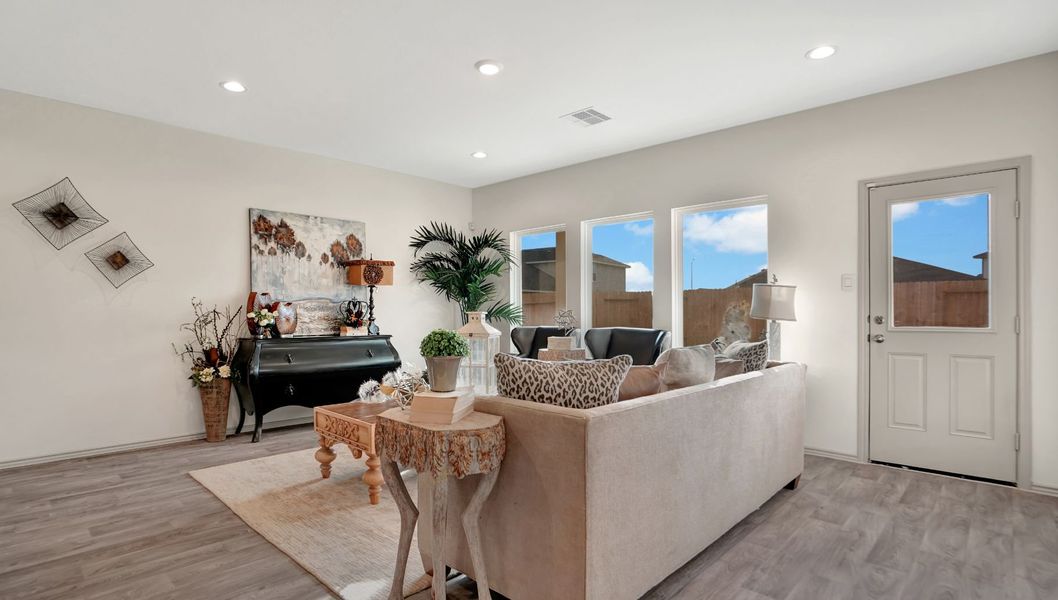Representative furnished interior of a home built from the Mitchell by D.R. Horton in Westward Pointe, Sealy (Image 12).