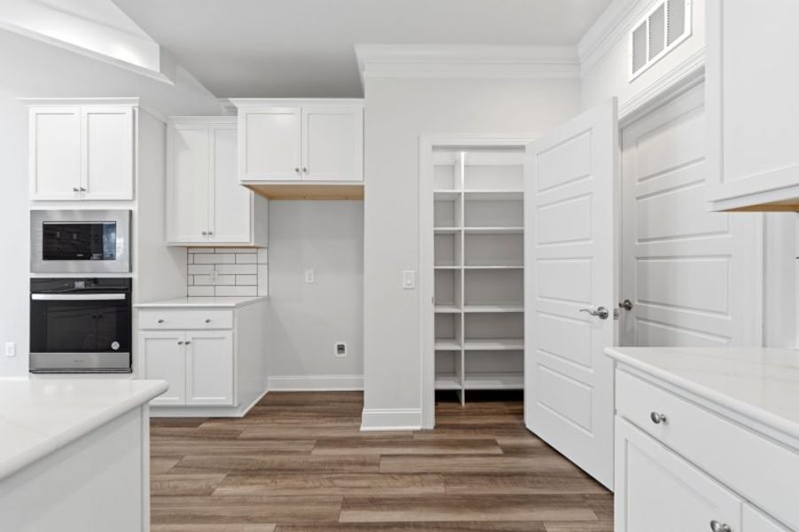 Furnished interior view inside a new home in Weybridge, Burlington (Image 14).