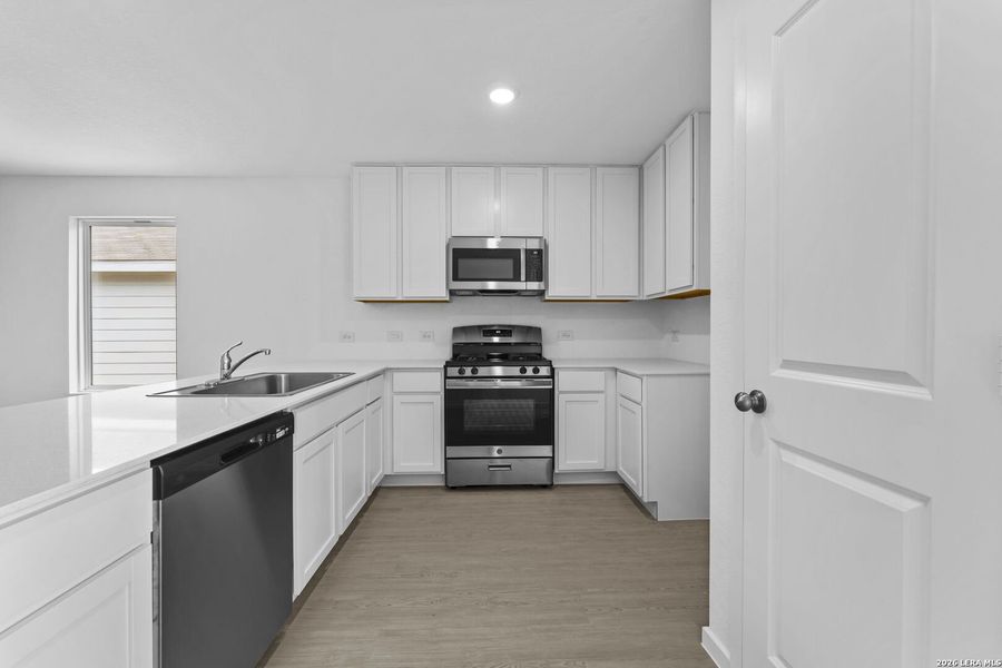 Furnished interior view inside a new home in Spring Grove, St. Hedwig (Image 3).