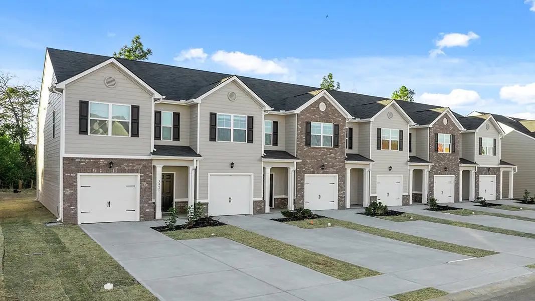 Front exterior of a new home in Laurel Park Townhomes, Hephzibah, GA, highlighting curb appeal (Image 2).