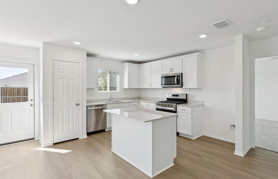 Spacious kitchen with access to backyard Spacious kitchen with access to backyard